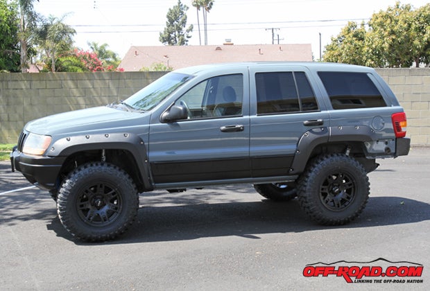 Our WJ has quite a different stance now with our 33-inch Mickey Thompson tires and new Sidebiter II wheels. 