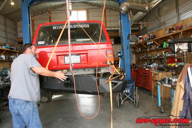 Before assembling the bumper and tire gate, make sure the bumper matches its mounting brackets.