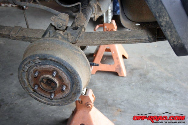 We did use jack stands to support the rear axle while working on the suspension.