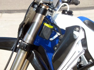Trick electronics are mounted forward of the gas tank.