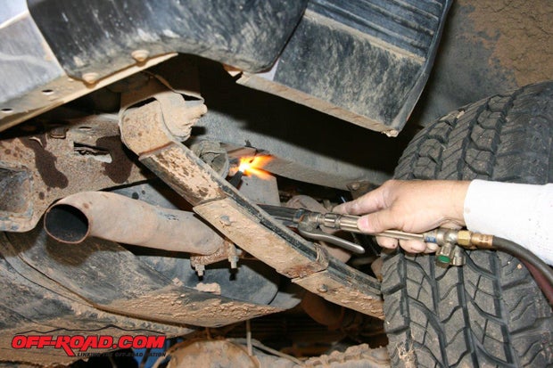 A hoist makes it much easier to remove the OEM bumper, even though you may need to heat some of the bolts to break them loose.