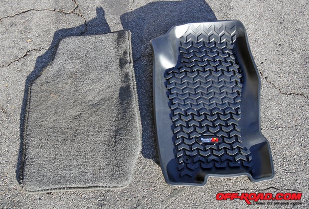 Out with the old and in with the new. We swapped out our cheap fabric mats for Rugged Ridges All-Terrain Floor Liners. 